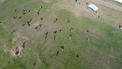 Aerial-drone-shot-of-Mongolian-wrestlers-Naadam-stadium-in-Mongolia.-Zoom-out